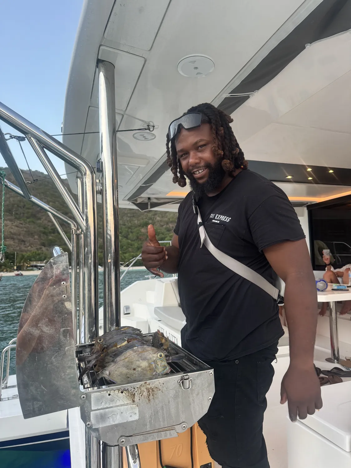 Captain Teno at the helm of his charter boat